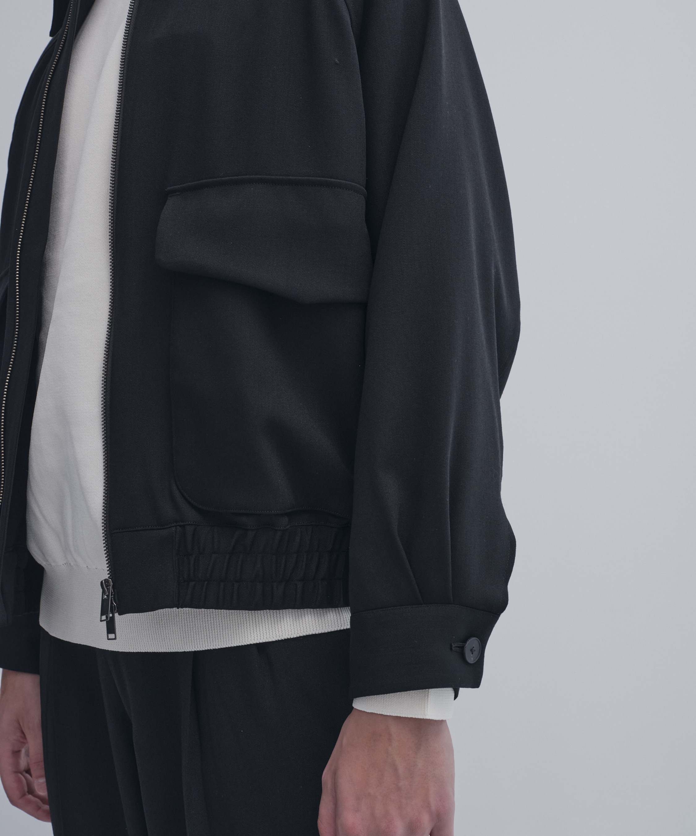 Super multi-flex ジップブルゾン