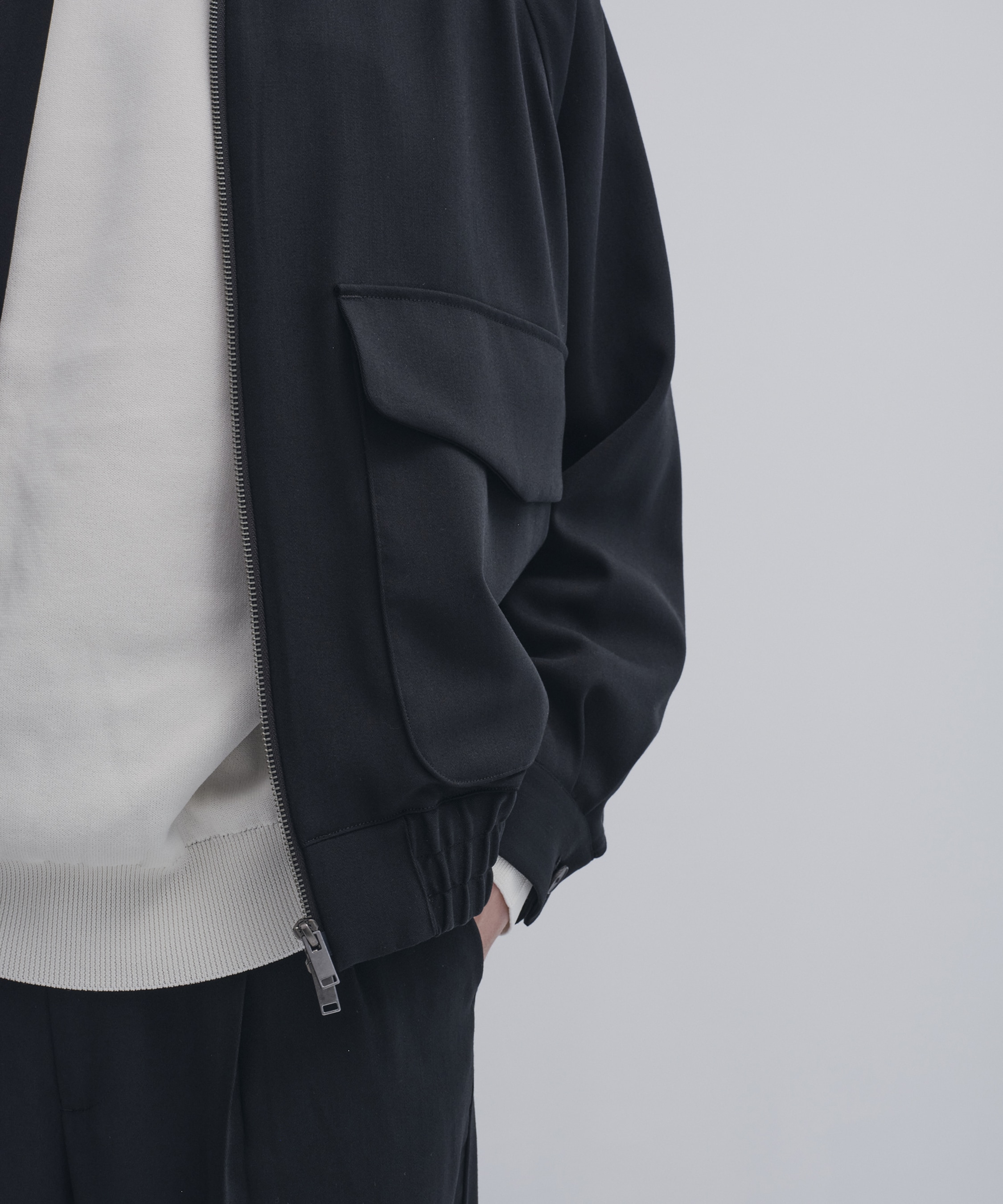 Super multi-flex ジップブルゾン