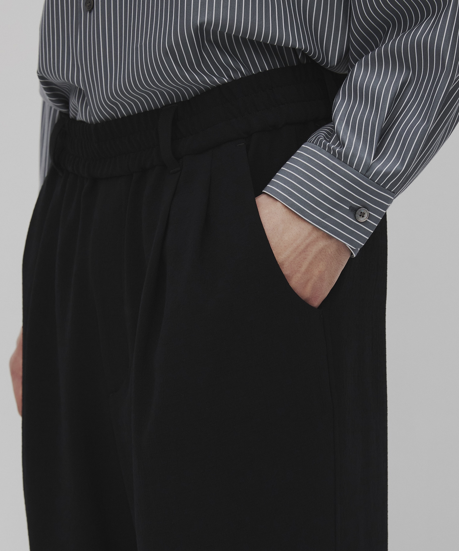 Multi-flex ワイドテーパードパンツ