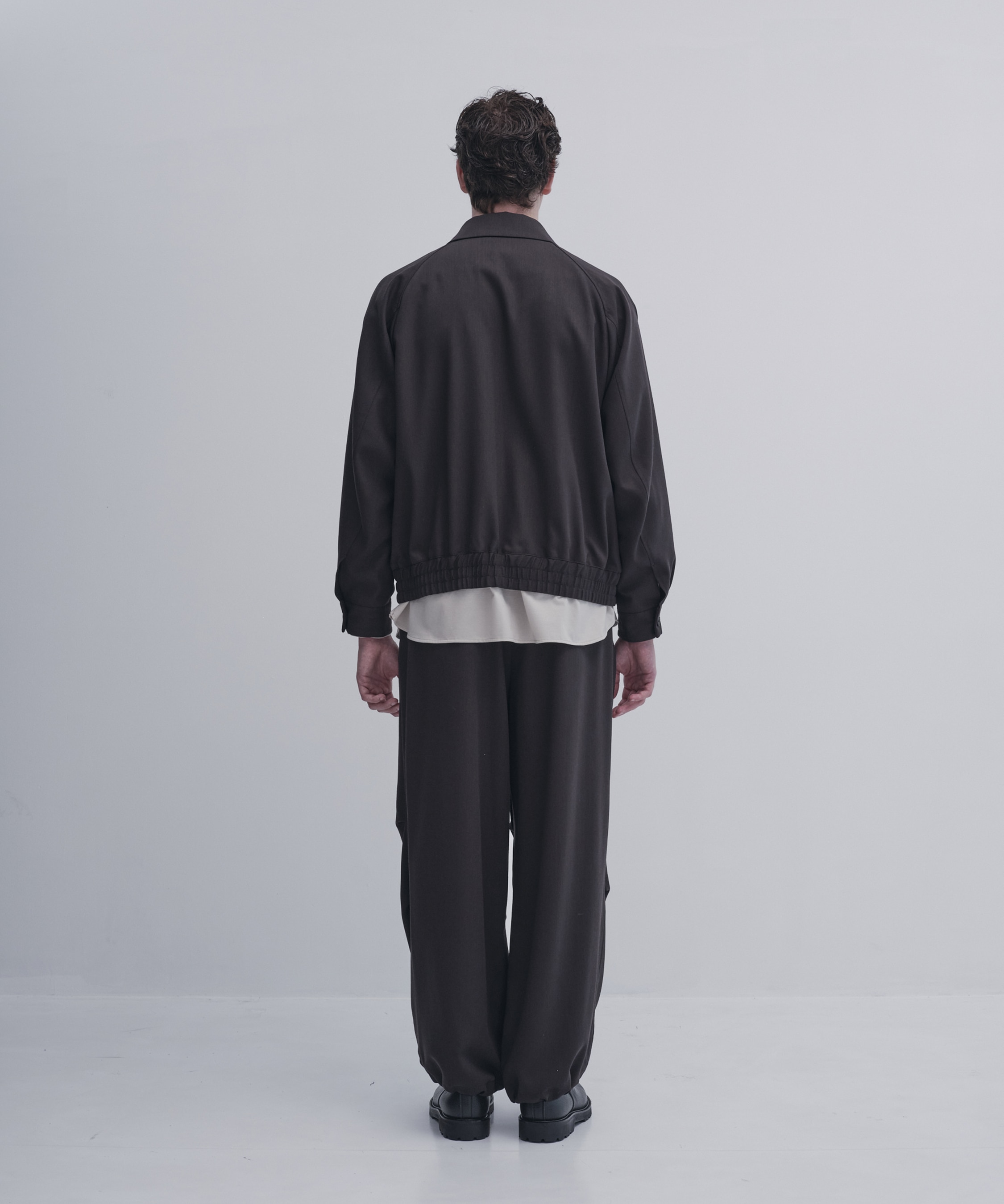 Super multi-flex ジップブルゾン